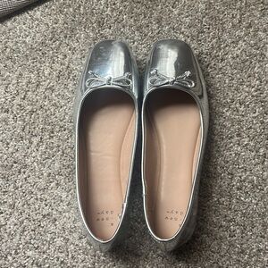 A new day size 8.5 silver metallic flats with bow